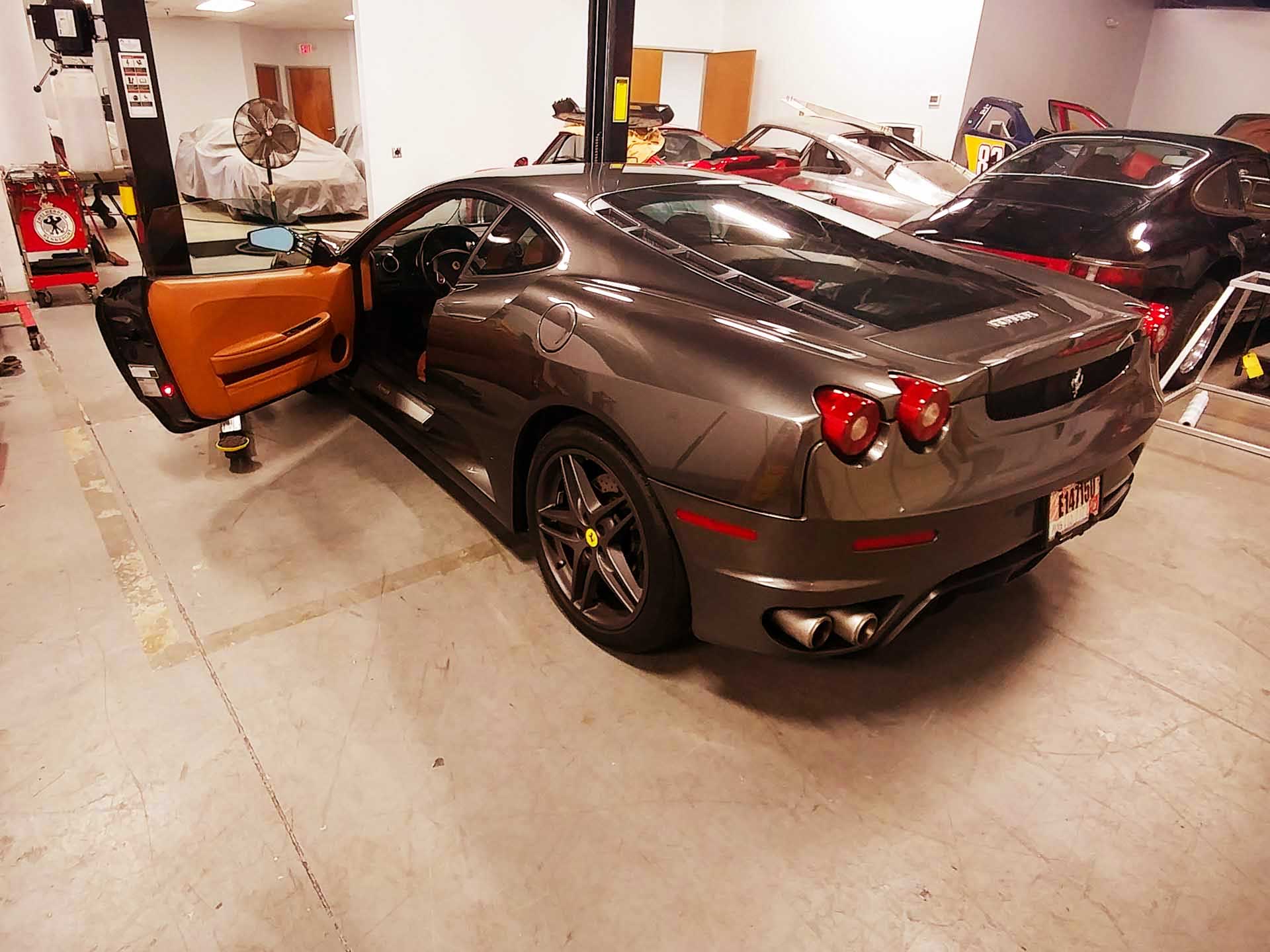 ferrari f430 being serviced in shop